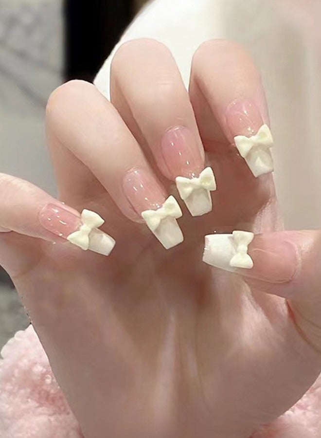 NIBEMINENT 24Pcs Fake Nails, Press Nails In Box,Long-length Flat head shaped Solid Skin White Color Shiny Nail Art,Bow knot,Fake Nail Patch - Image 1