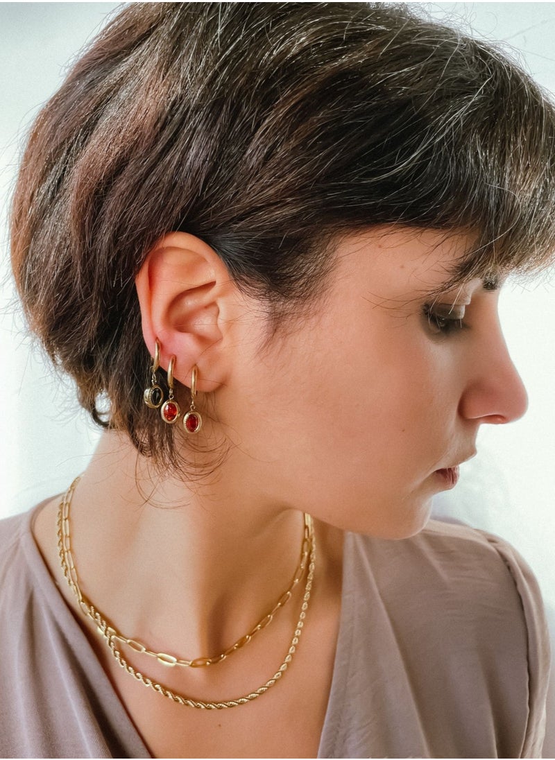 Clé de Lune - Stone Oval Huggies Earrings- Black - Image 1