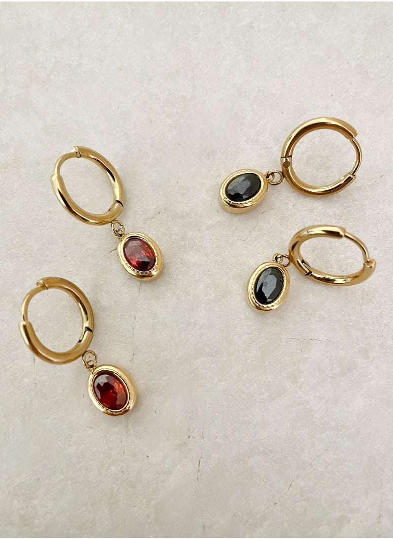 Clé de Lune - Stone Oval Huggies Earrings- Black - Image 1