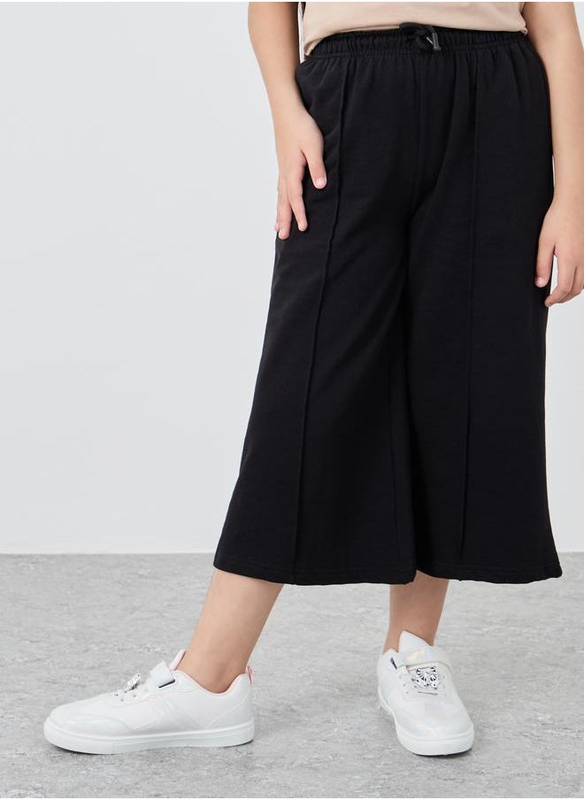 Styli Styli Girls Black Solid Pintuck Wide Leg Culottes  - Image 1