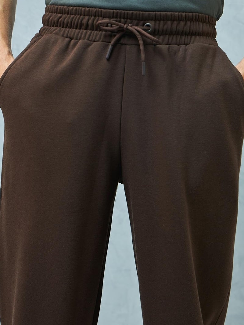 Bewakoof Men's Solid Super Loose Fit Cotton Blend Joggers_ 617457 Brown 2XL - Image 4