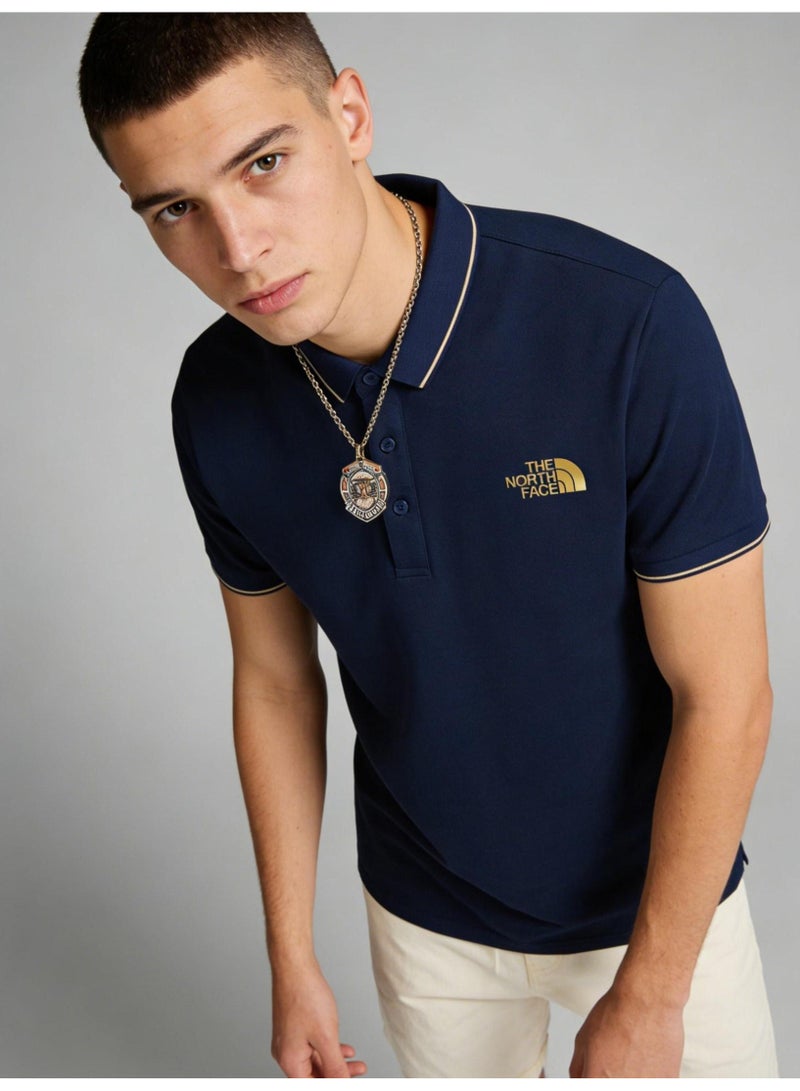The North Face Contrast Trim Polo Shirt | Premium Moisture-Wicking Piqué Cotton Short Sleeve Casual Top with Gold Logo Embroidery - Image 1