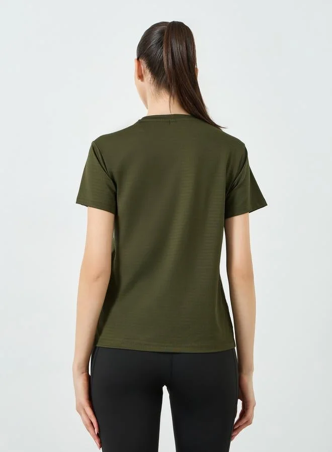 Styli Active  Textured Basic Short Sleeve Top for Women | Best Price UAE