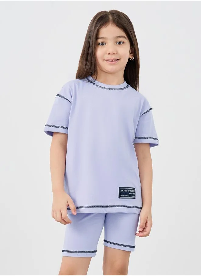Styli Styli Oversized Badge Detail T-Shirt and Cycle Shorts Set