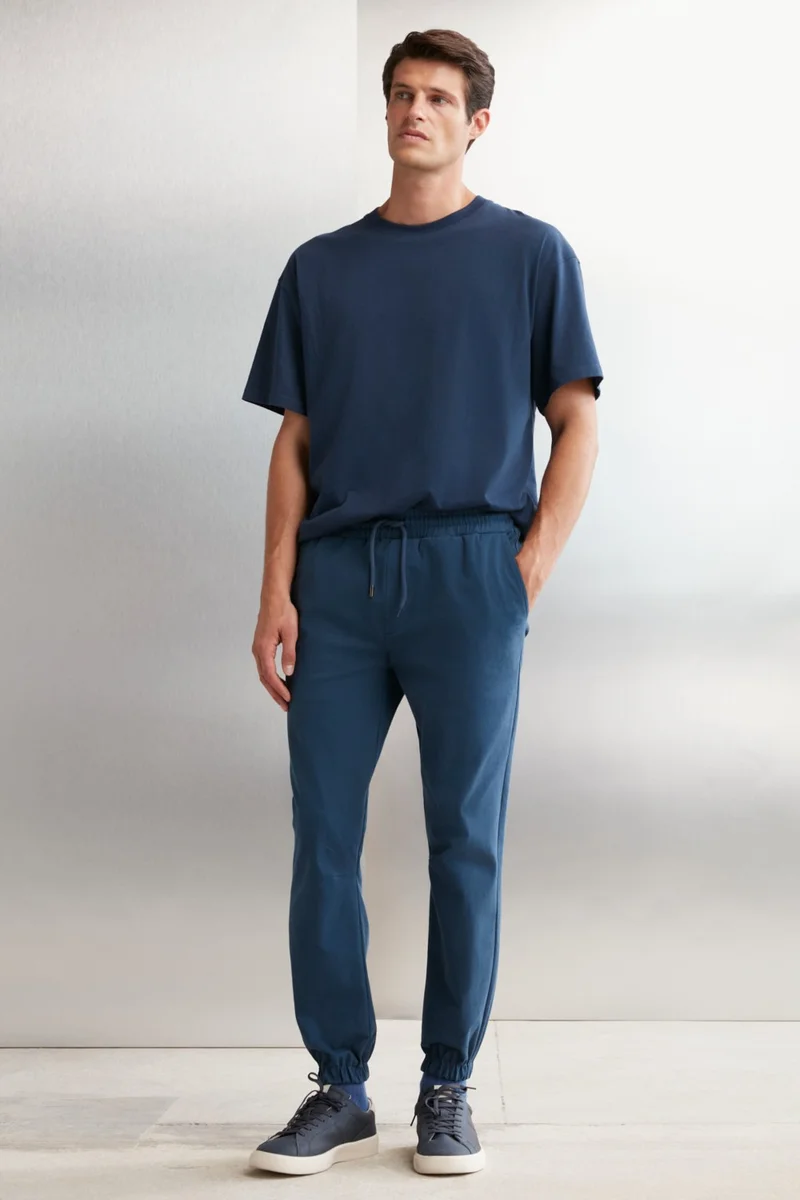 GRIMELANGE Jakob Men's Woven Washed 4 Pocket Thick Textured Elastic Leg Blue Trousers