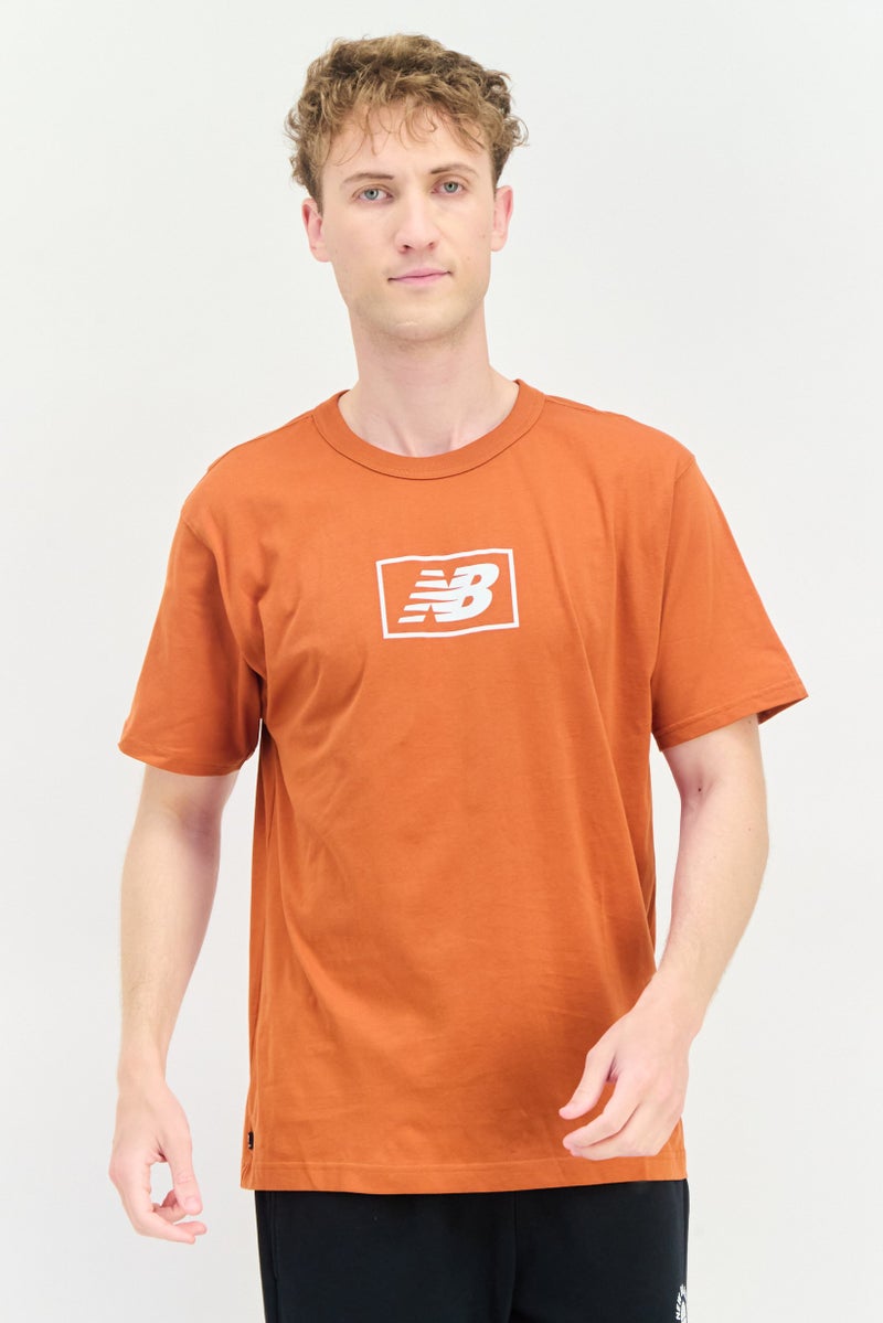 New Balance Men Relaxed Fit Short Sleeves Outdoor T-Shirt, Rust - Image 1