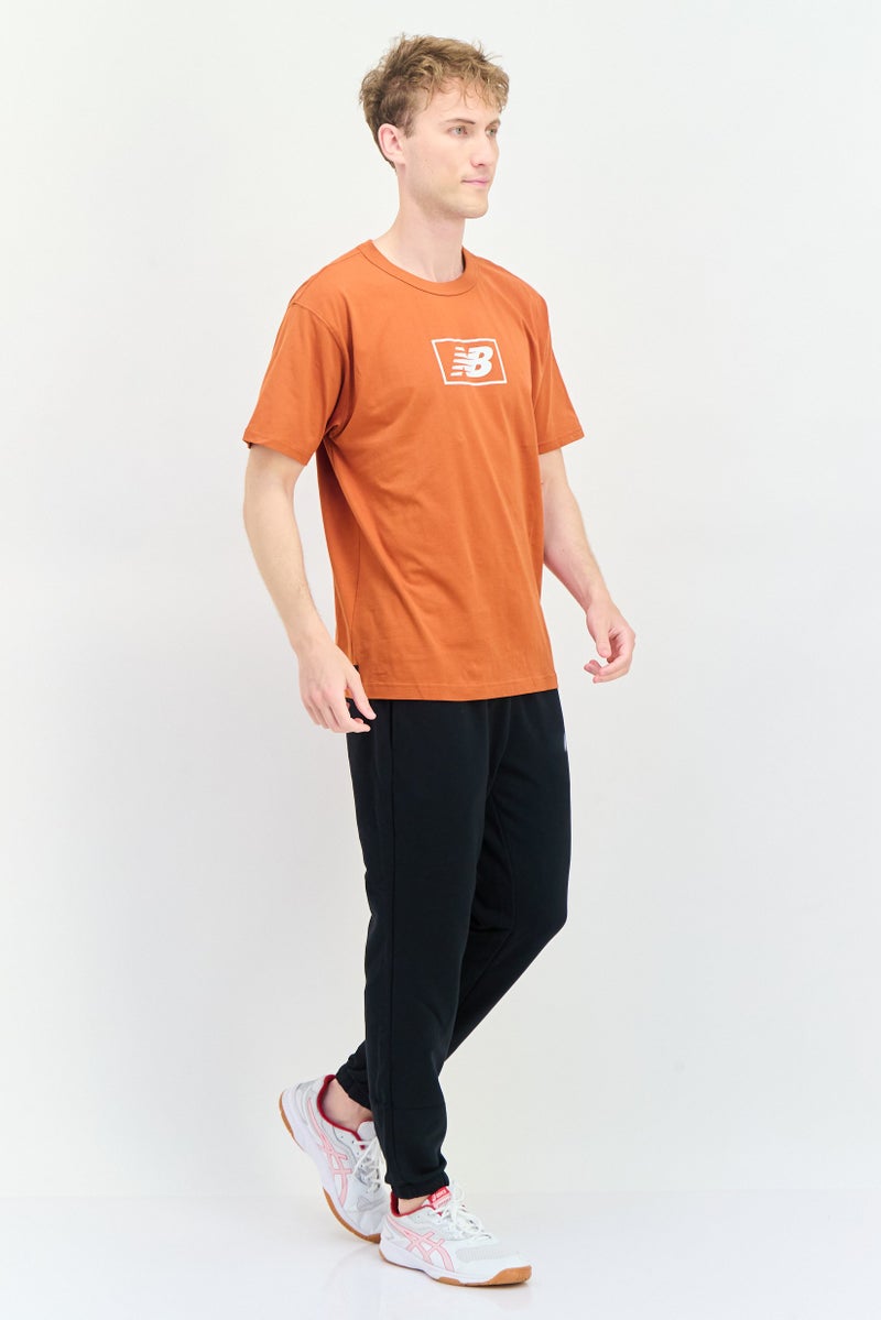 New Balance Men Relaxed Fit Short Sleeves Outdoor T-Shirt, Rust - Image 4