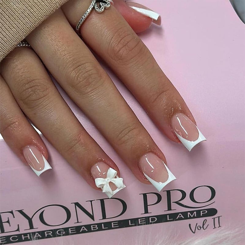 Mkwntg French Tip Press on Nails - Short Square Fake Nude False Nails With 3D Resin Bow Charm Designs - Glossy White French Glue on Cute Bow Stick on Nails for Women Girls - 24Pcs - Image 1