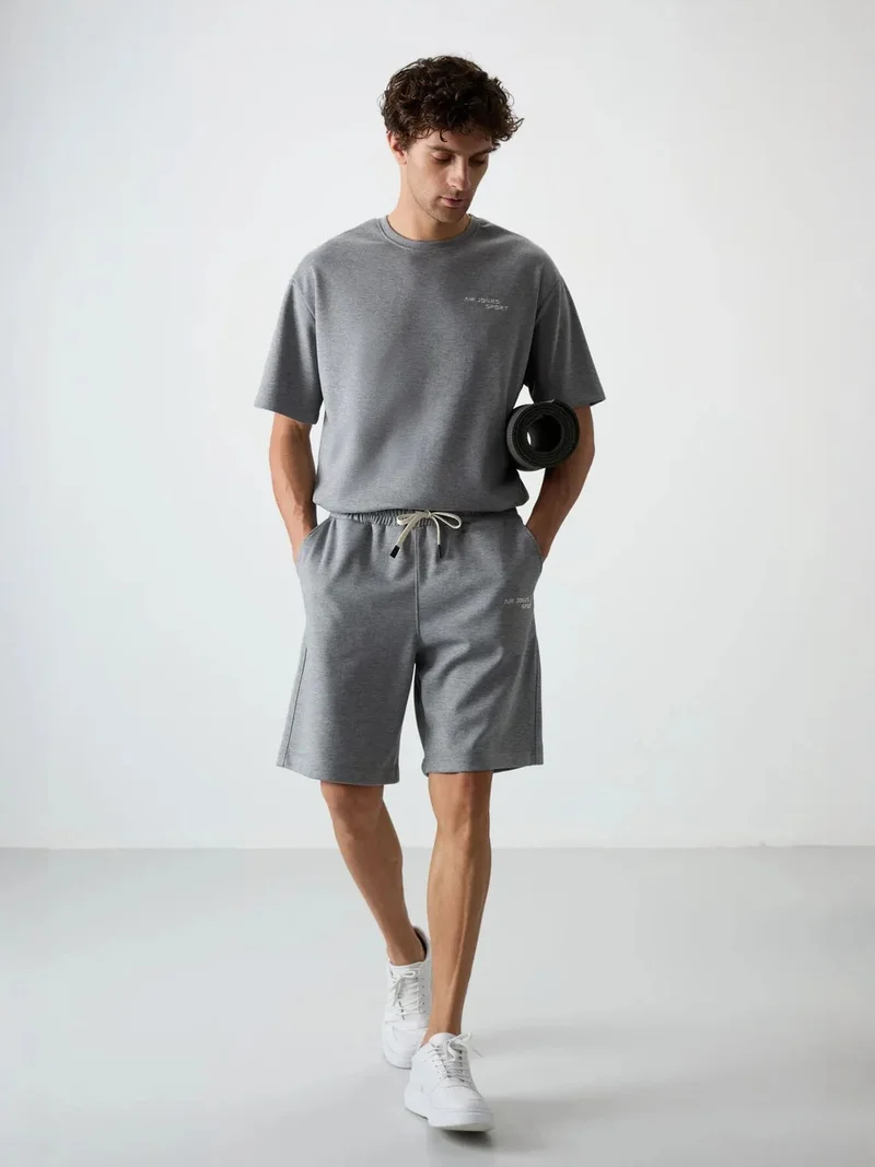 تومي لايف TOMMY Oversized Short-Sleeve T-Shirt And Shorts Set