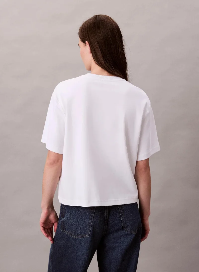 Calvin Klein Jeans Brilliant White Embroidered Logo Graphic Classic T-Shirt for Women | Best Price UAE