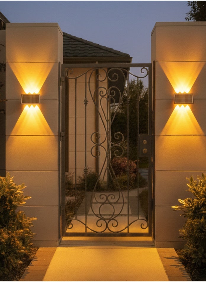 مودي مصباح حائط يعمل بالطاقة الشمسية، ضوء ذهبي، 6 مصابيح LED للأعلى والأسفل، مقاوم للماء IP65، يعمل بالطاقة الشمسية، فيلا، حديقة، سياج، شرفة، مصباح حائط زخرفي مع وقت تشغيل 8 ساعات، قطعتين - Image 1