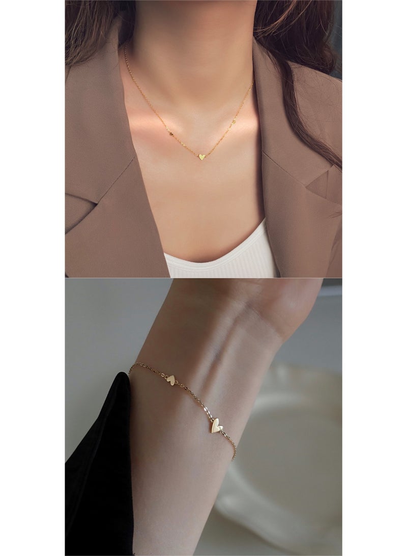 يوكانبي عقد قلب دقيق من الفولاذ التيتانيوم مع سلسلة عظمة الترقوة بتركيب 18K | أنيق، متعدد الاستخدامات، طقم عقد وسوار - Image 1