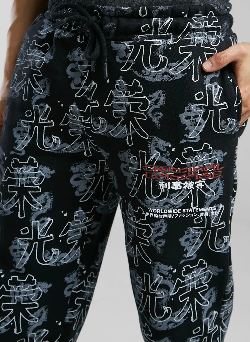 CRIMINAL DAMAGE Dragon Aop Sweatpants