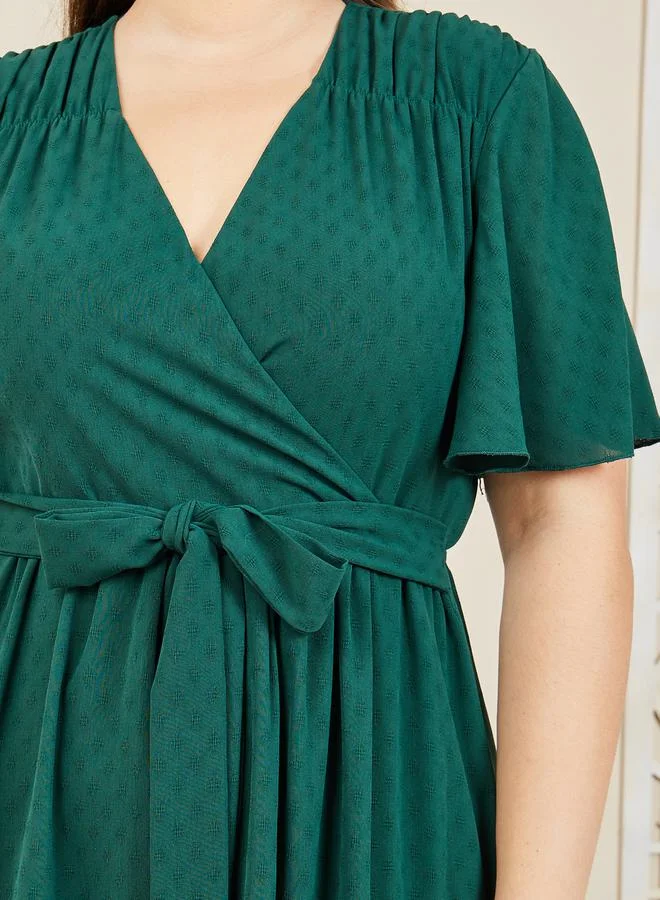 ستايلي Textured A-Line Tiered Midi Dress with Self Tie Up