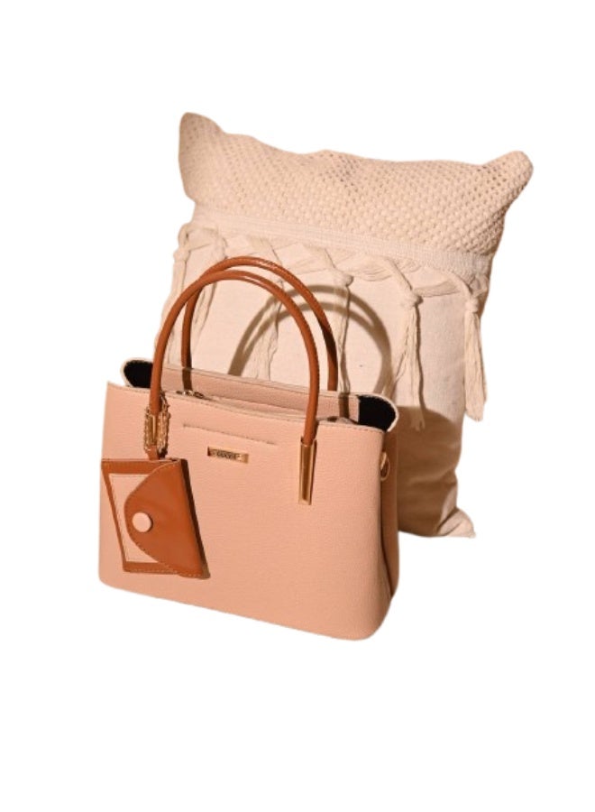 Elegant women's leather handbag in light brown with a leather handle and strap.