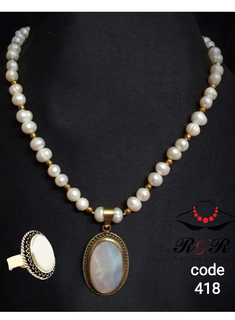 R&R Women's set, a medium-length necklace and ring of natural cultured pearls with a seashell pendant 