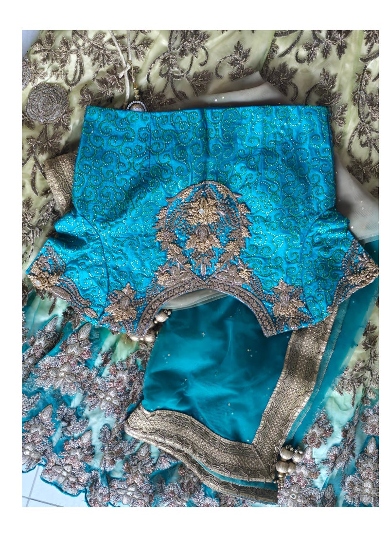 Grab Mantra - Ready To Wear Golden Turquoise Green Net Lehenga With Golden Embroidery Having Stones Plus Stitched blouse Medium Size And Net dupatta - Image 1