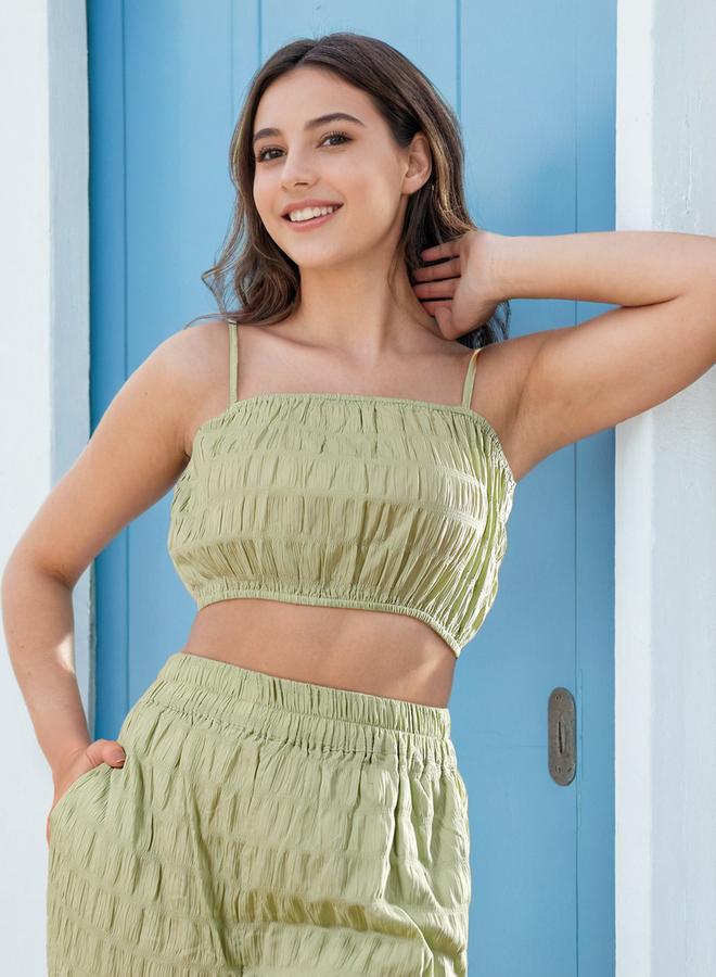 مرفوعة طقم بلوزة قصيرة بنسيج أخضر مع بنطال بأرجل واسعة - Image 1