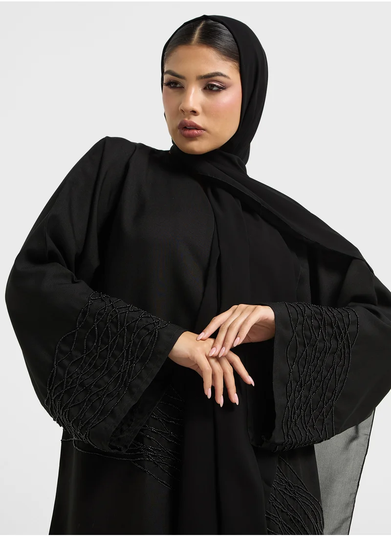 هيا كلوزيت Embellished V-Neck Flared Sleeve Abaya