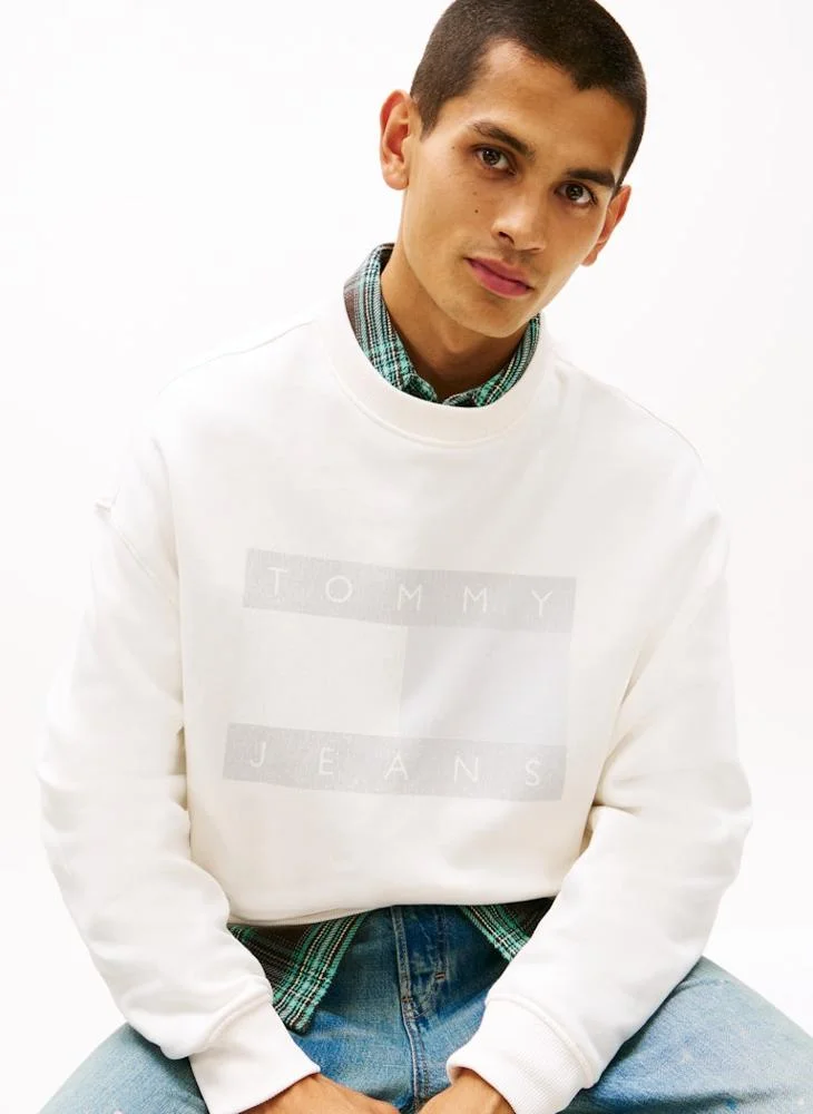 TOMMY JEANS  90S Distressed Flag Crew Neck Sweatshirt for Men | Best Price UAE