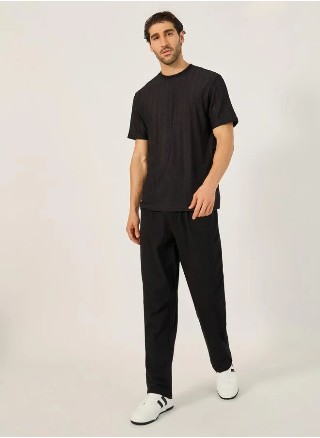 ستايلي Textured Relaxed Fit Pleated Trousers