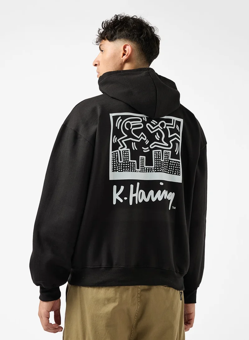 سفنتي فايف هودي واسع بظهر مطبوع