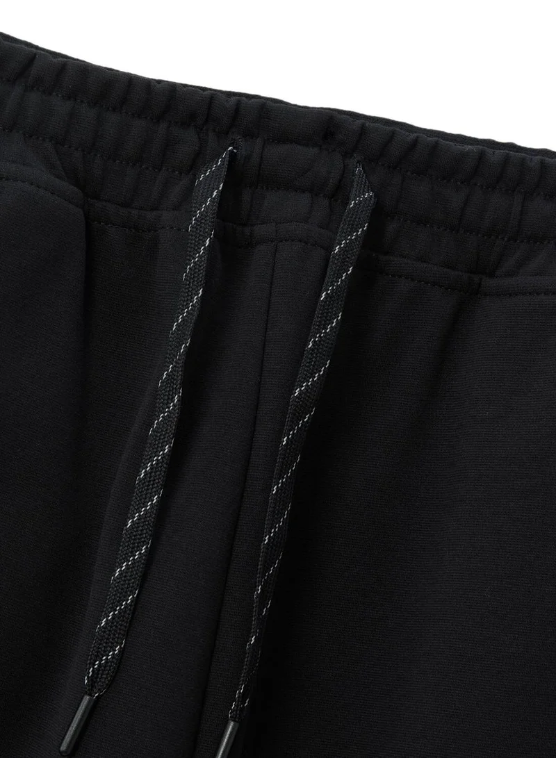 GIORDANO  Men's Cotton Polyester Stretch Interlock Joggers - Relaxed Taper Fit for Men | Best Price UAE