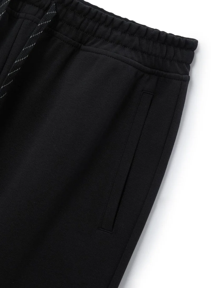 GIORDANO  Men's Cotton Polyester Stretch Interlock Joggers - Relaxed Taper Fit for Men | Best Price UAE