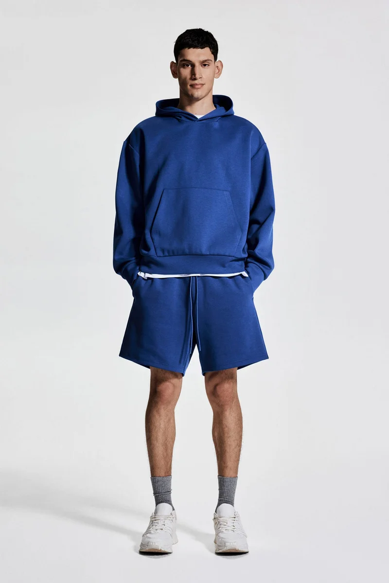 H&M Mid-length sports shorts with DryMove™