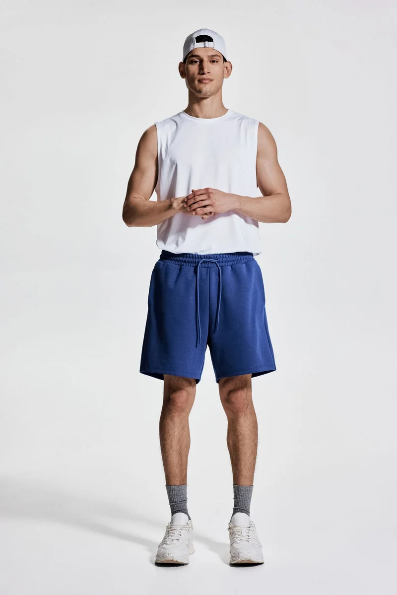 H&M Mid-length sports shorts with DryMove™