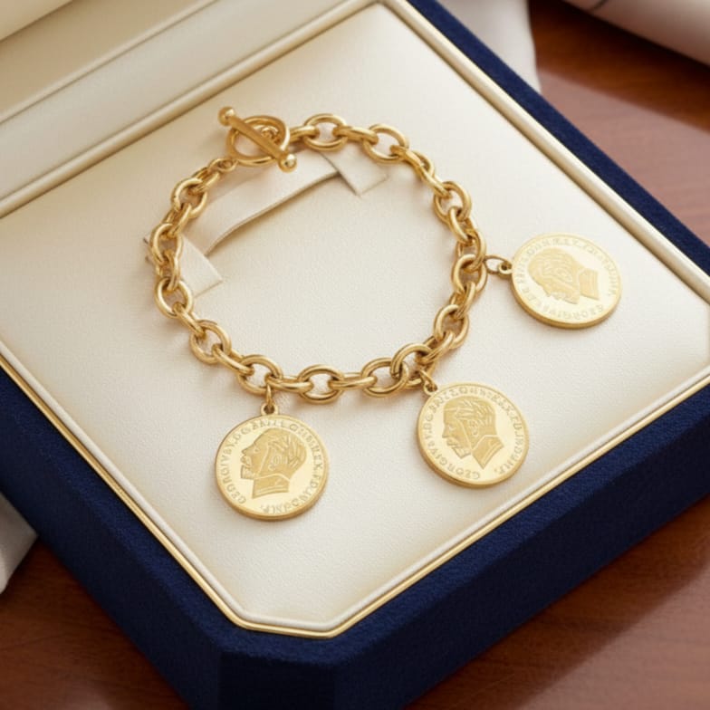 An elegant gold bracelet made of rust-resistant stainless steel, with a classic chain design adorned with three elegant coins, and an adjustable clasp to suit you. - Image 5