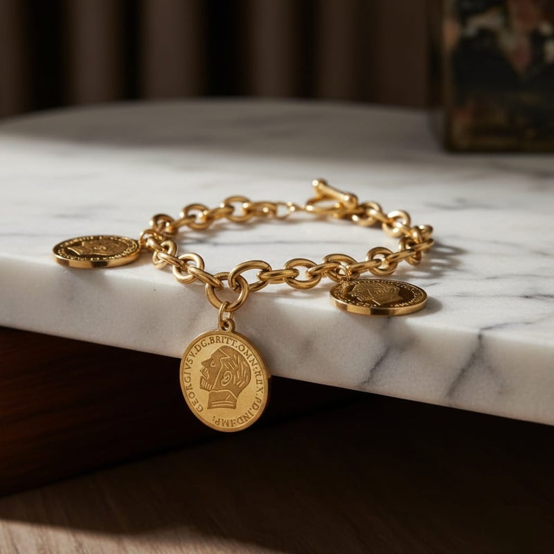 An elegant gold bracelet made of rust-resistant stainless steel, with a classic chain design adorned with three elegant coins, and an adjustable clasp to suit you. - Image 4