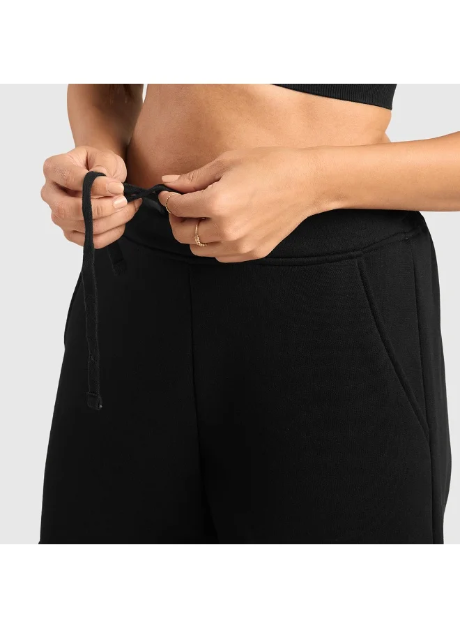 Musclemind Women's Cloud Ease Fleece Cargo Pants with Super Soft And Stretchable Fabric, 6 Deep Pockets, Hidden- Inner Drawstrings, Anti-Pill, Shape Retention, Long-Lasting Colour, Super Soft And Breathable Fabric, Along with Temperature Regulation Tech