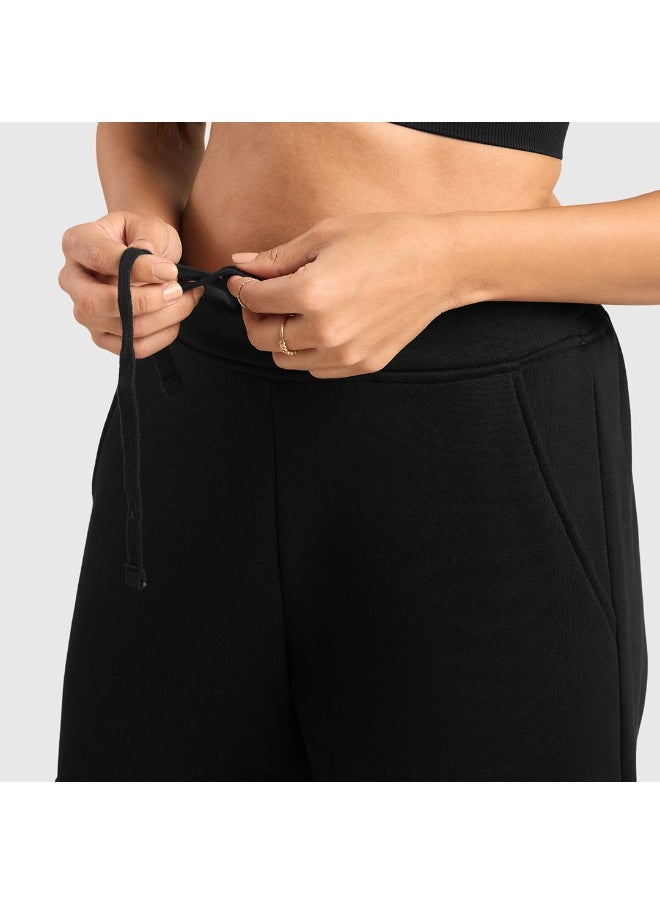 Musclemind - Women's Cloud Ease Fleece Cargo Pants with Super Soft And Stretchable Fabric, 6 Deep Pockets, Hidden- Inner Drawstrings, Anti-Pill, Shape Retention, Long-Lasting Colour, Super Soft And Breathable Fabric, Along with Temperature Regulation Tech - Image 1
