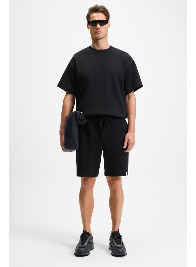 GRIMELANGE BAILEY Men's Elastic Waist Back Single Pocket Corded Relaxed Fit Black Shorts. - Image 2