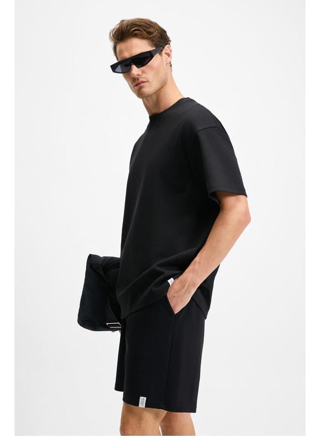 GRIMELANGE BAILEY Men's Elastic Waist Back Single Pocket Corded Relaxed Fit Black Shorts. - Image 3