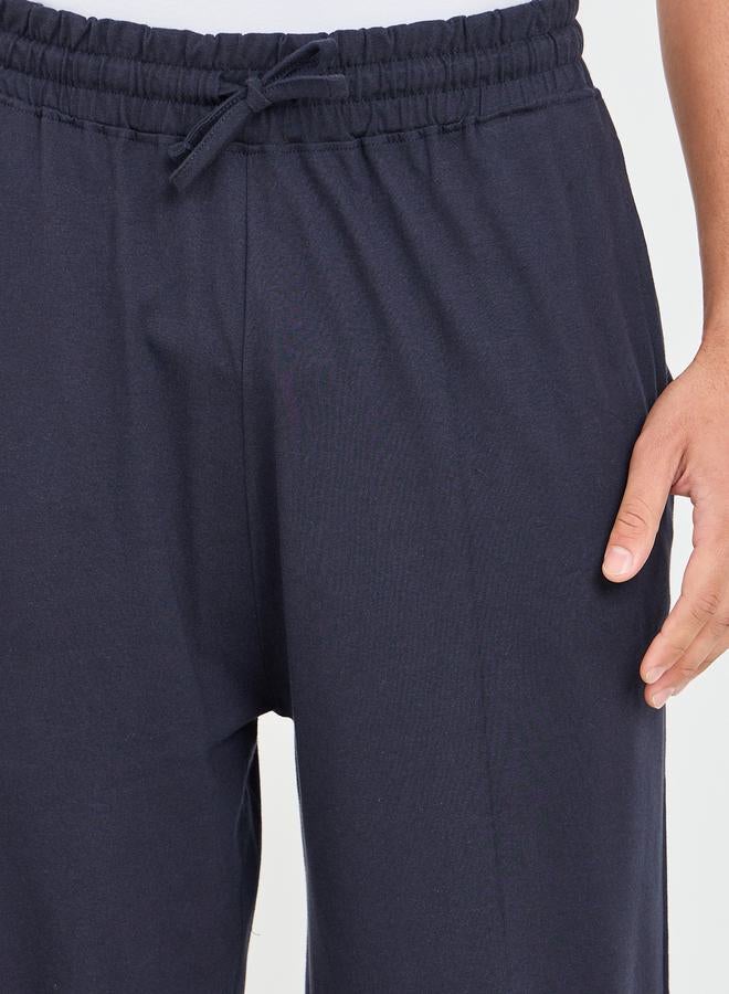 ستايلي بنطلون بيجاما واسع الساق بتفاصيل جيب وحزام خصر برباط - Image 3