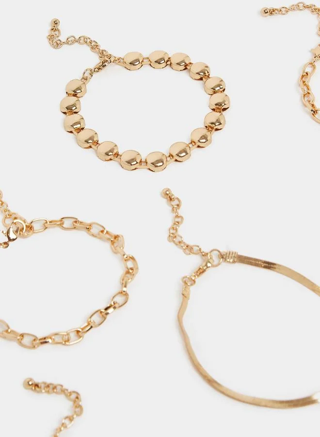 Styli  Styli Set of 8 - Gold Tone Layered Bracelets for Women | Best Price UAE