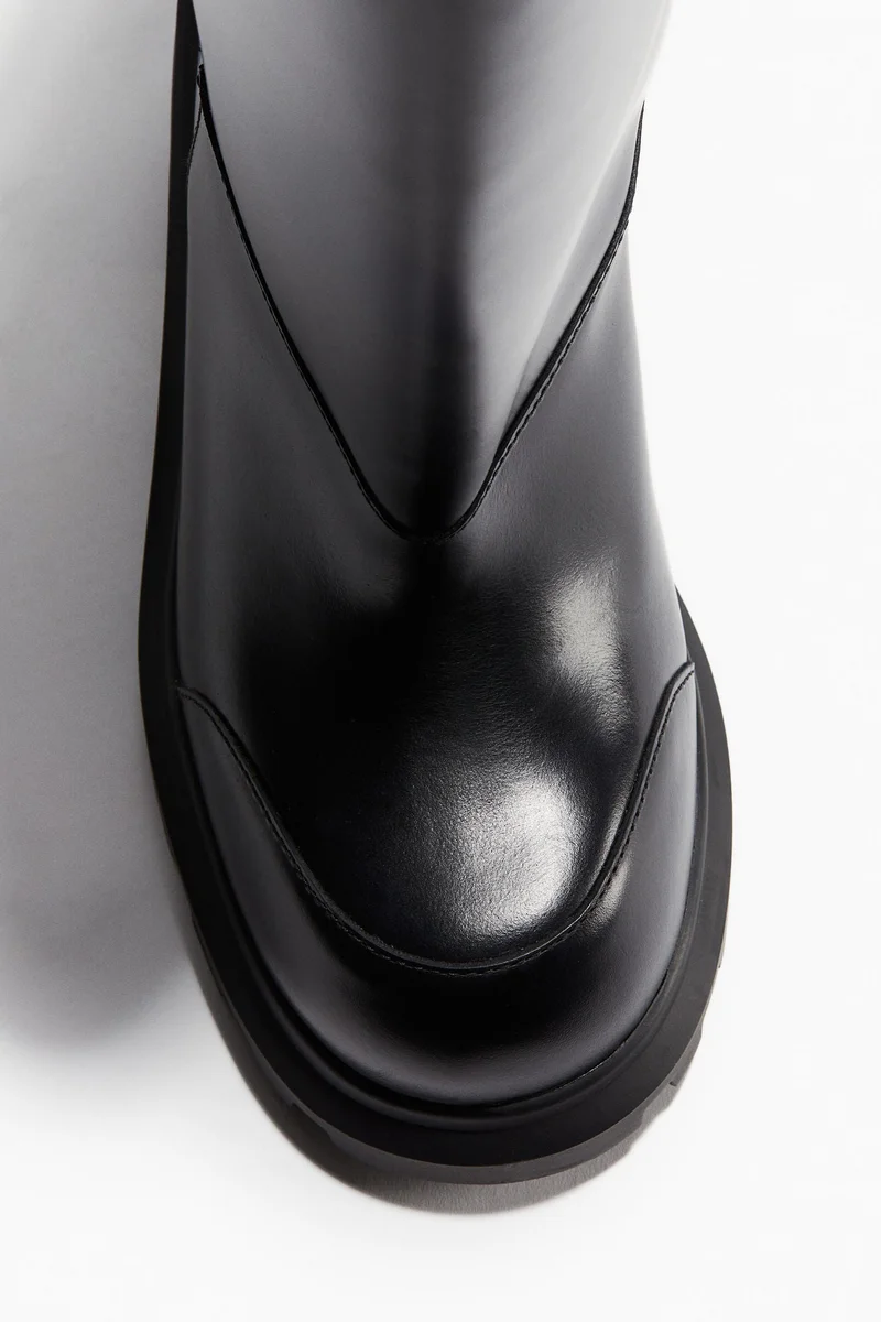 اتش اند ام بووت من الجلد بنعل سميك