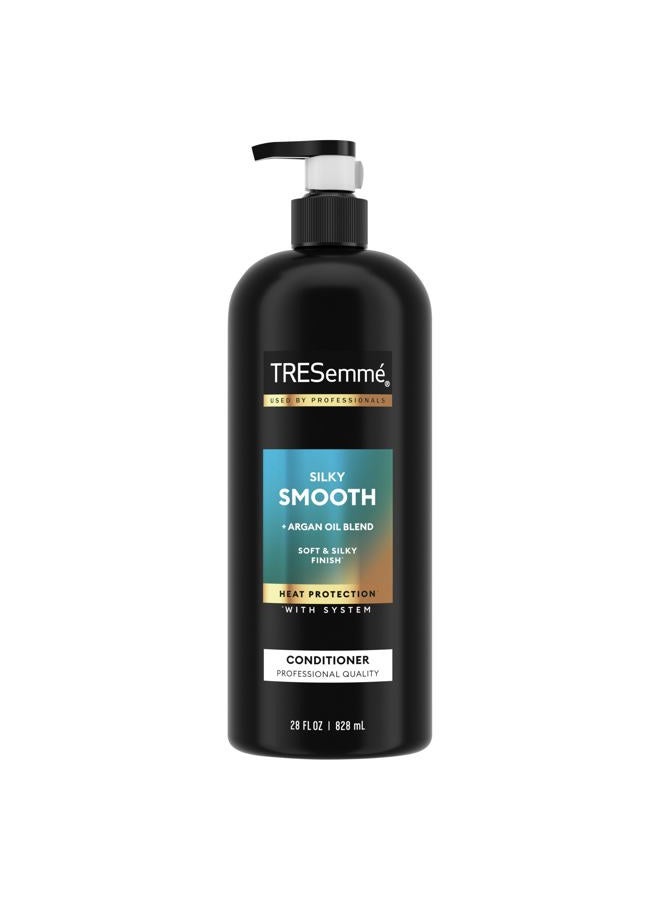 TRESemmé Silky & Smooth Anti-Frizz Conditioner for Frizzy Hair Formulated With Pro Style Technology 28 Fl oz - Image 1