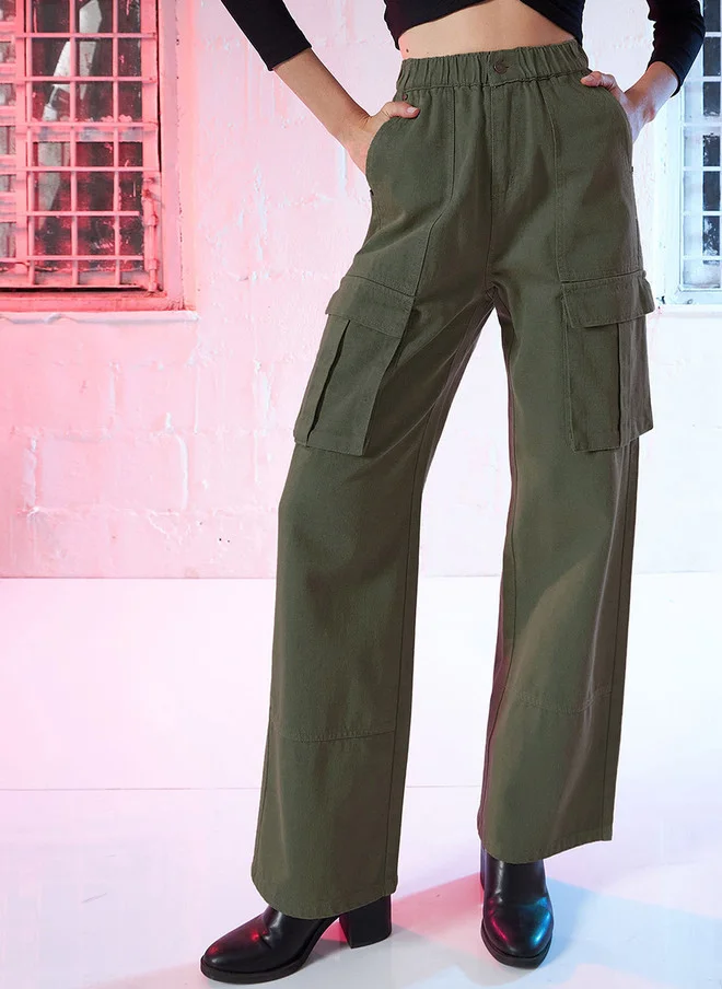 ساسافراس جينز نسائي بخصر مرتفع ولون زيتوني وجيوب