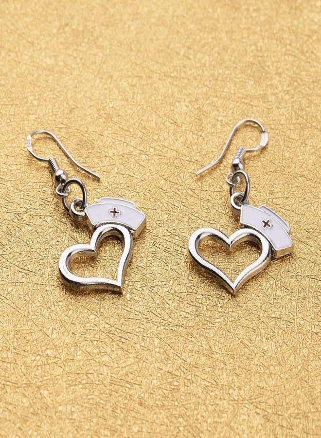 اكتاب أقراط AKTAP الطبية برمز طبي، أقراط للممرضات، هدية طبية للأطباء والممرضات وطلاب الطب، هدية للممرضات المسجلات، والمساعدات الطبية، ومساعدي الأطباء، والممرضات الممارسات، والأطباء البيطريين (أقراط على شكل قبعة ممرضة) - Image 4