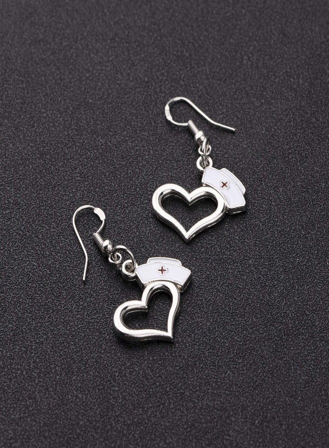 اكتاب أقراط AKTAP الطبية برمز طبي، أقراط للممرضات، هدية طبية للأطباء والممرضات وطلاب الطب، هدية للممرضات المسجلات، والمساعدات الطبية، ومساعدي الأطباء، والممرضات الممارسات، والأطباء البيطريين (أقراط على شكل قبعة ممرضة) - Image 2