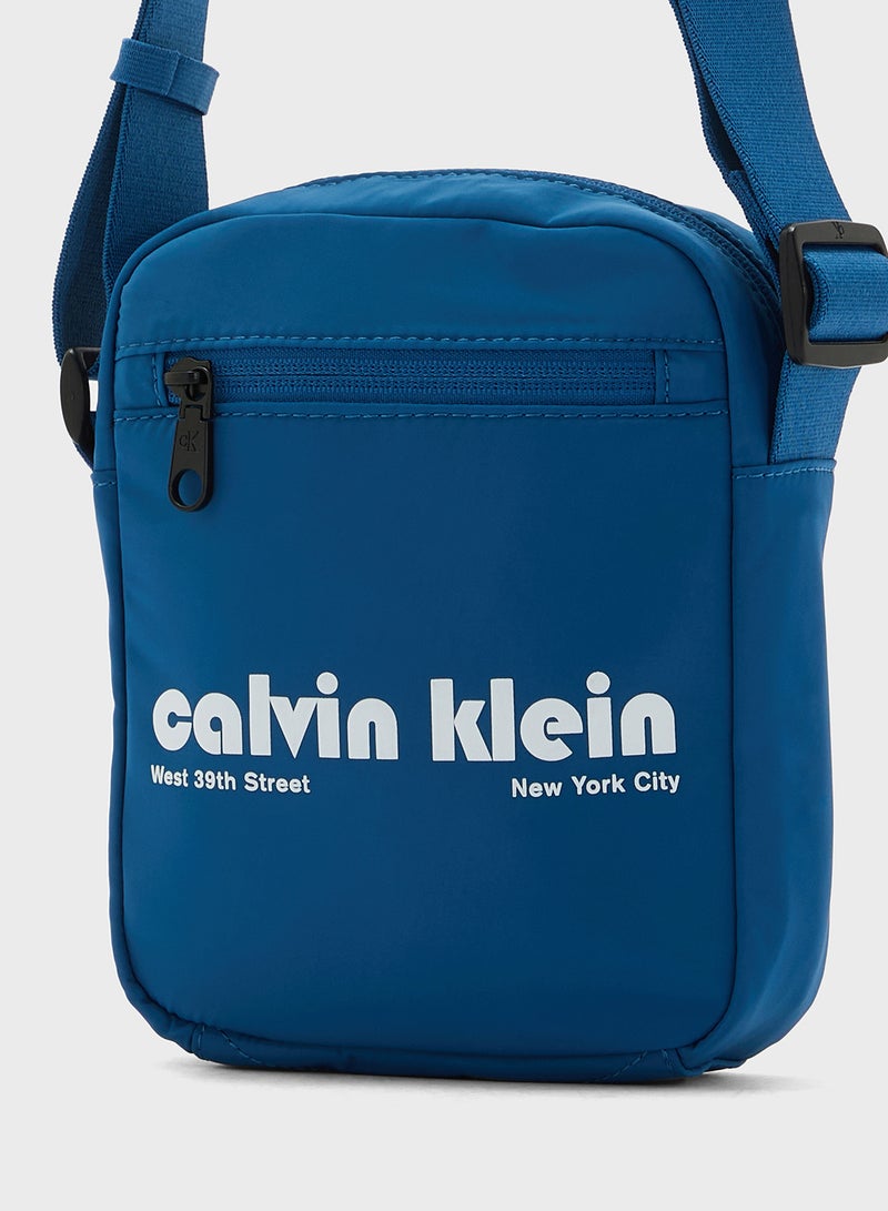 Calvin Klein Jeans Graphic Reporter Bag - Image 4