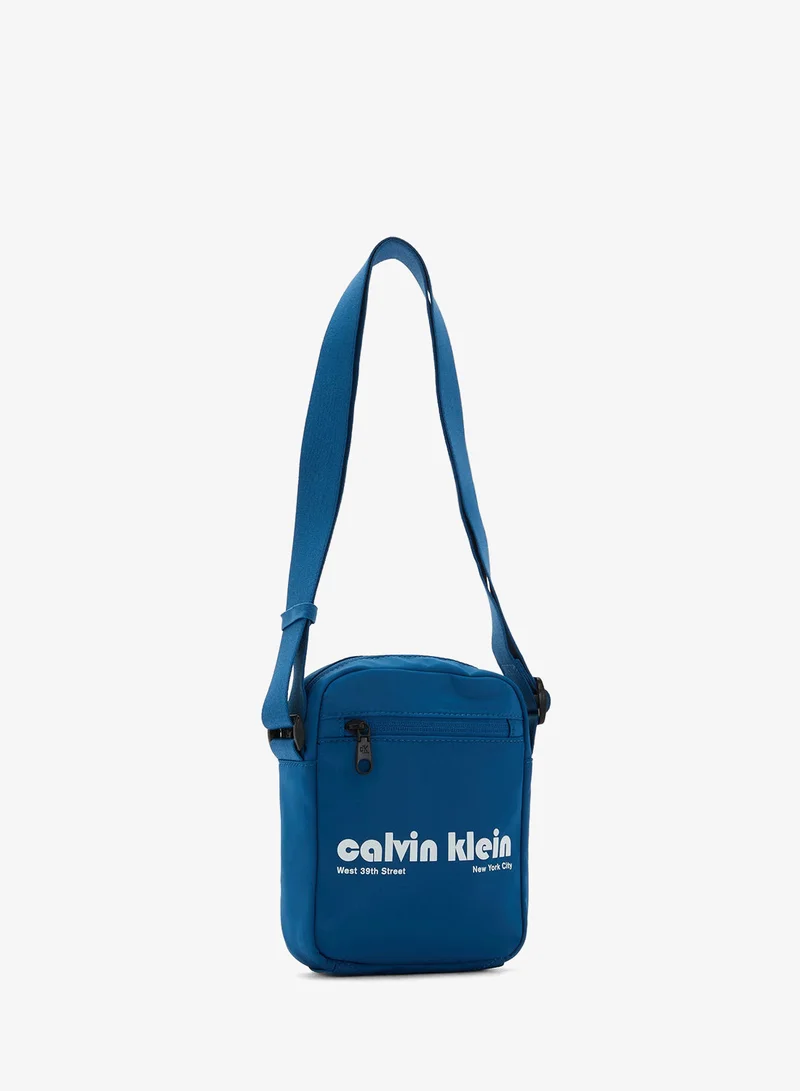 Calvin Klein Jeans  Graphic Reporter Bag for Men | Best Price UAE