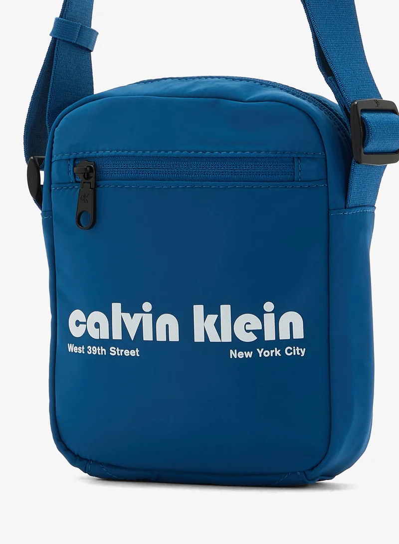 Calvin Klein Jeans  Graphic Reporter Bag for Men | Best Price UAE