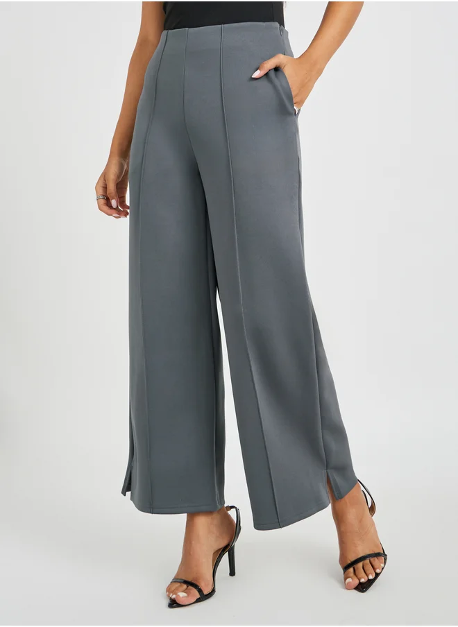 Styli Pin Tuck Detail Slit Hem Straight Knit Pants