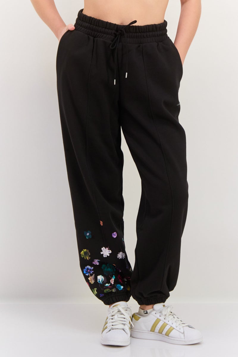 PUMA Women Sportswear Fit Drawstring Outdoor Pants, Black Combo - Image 1