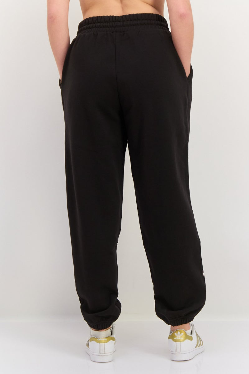 PUMA Women Sportswear Fit Drawstring Outdoor Pants, Black Combo - Image 3