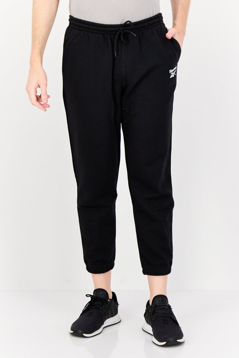 Reebok Women Sportswear Fit Outdoor Sweatpant, Black - Image 1